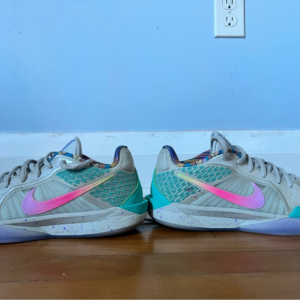 Nike Sneakers with Pink and Teal Highlights